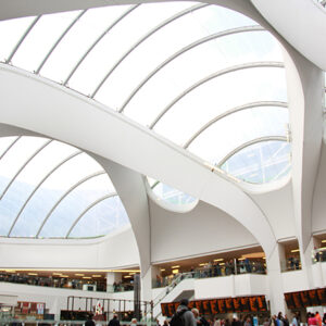 Perimeter bulkheads and cladding to walls of the roof openings
